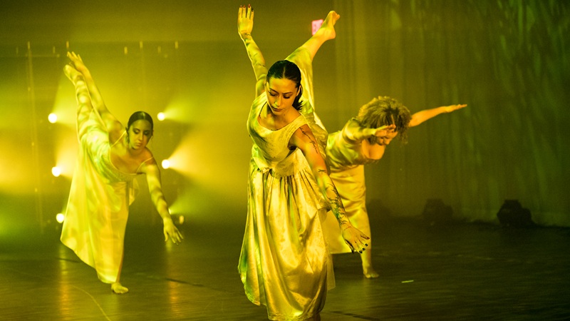 A student performing on stage