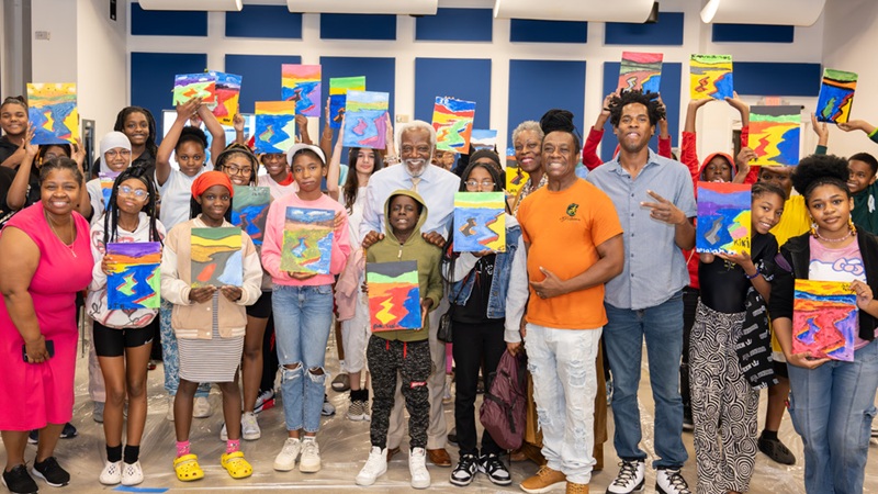 Student showcasing their artwork.